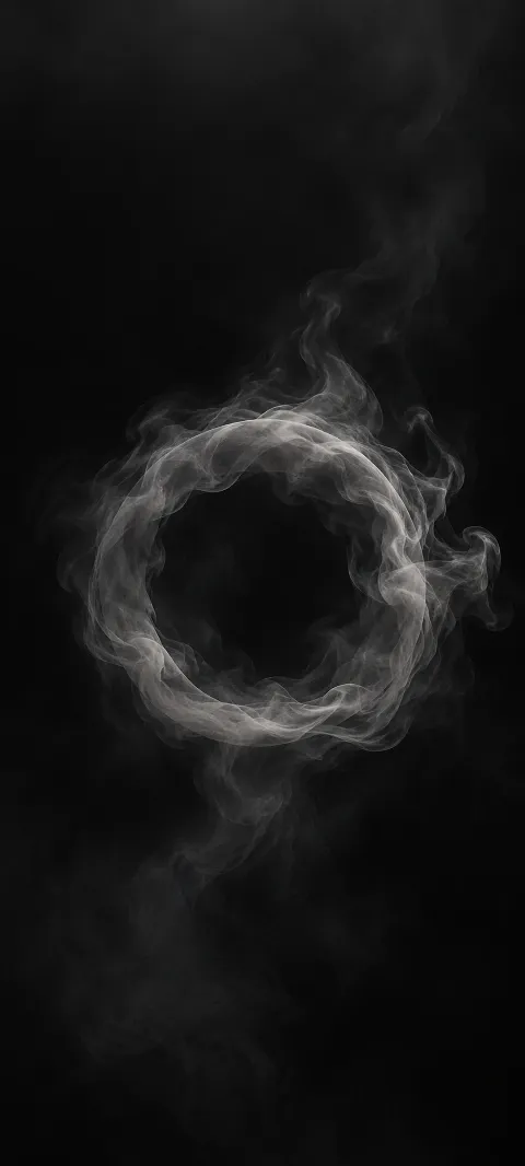 A faint gray smoke ring fades into black.