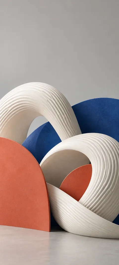 Ridged white ceramic curves layered among coral and cobalt panels.