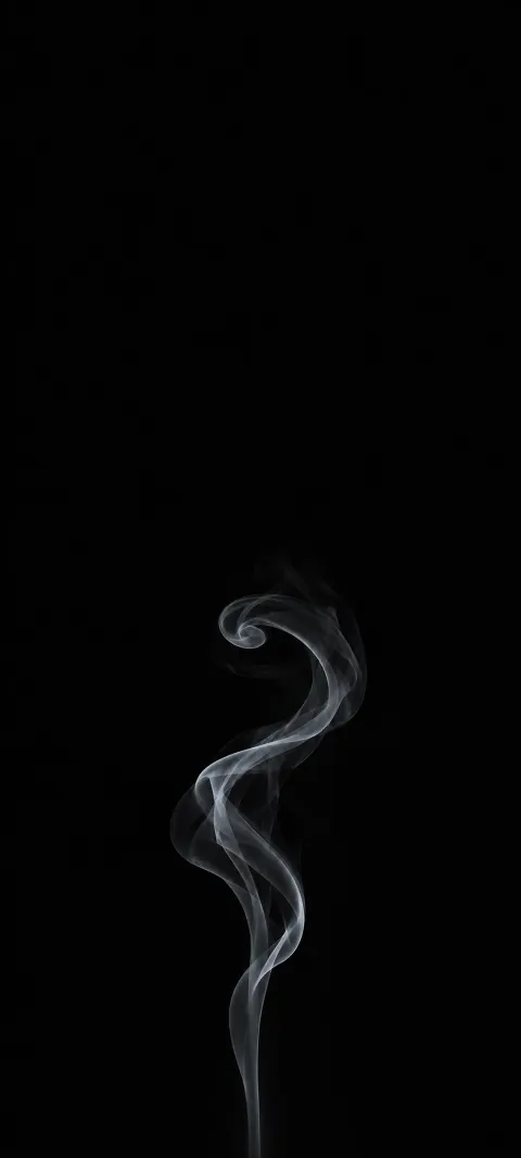 A silver-gray smoke plume curling against a matte black background.