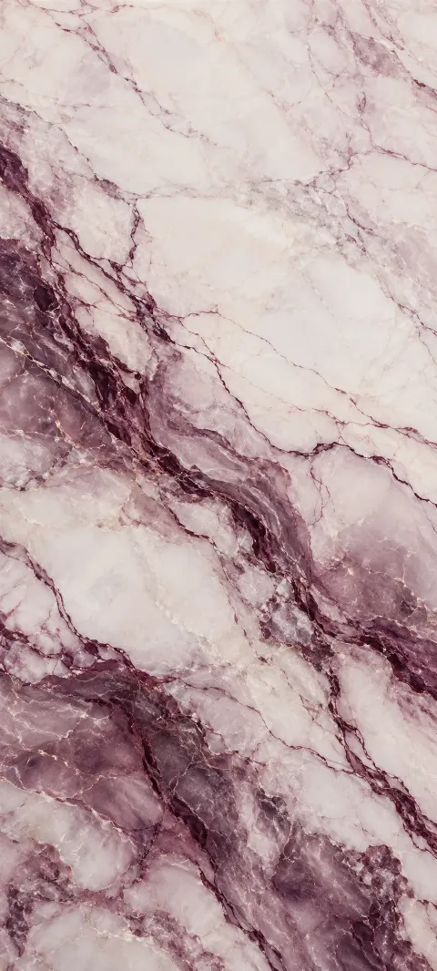 Plum marble veins sweep across pale stone.