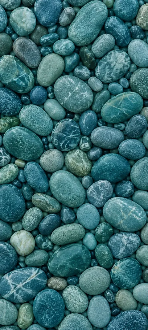 Rounded teal pebbles form an even tactile surface.