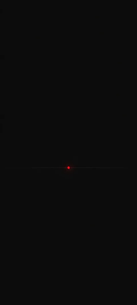 A small red point rests above a dark horizon.