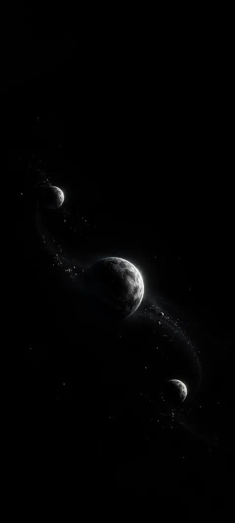 Three tiny silver planets punctuate a black field.