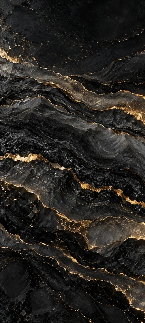 Black mineral grain carries narrow gold seams.