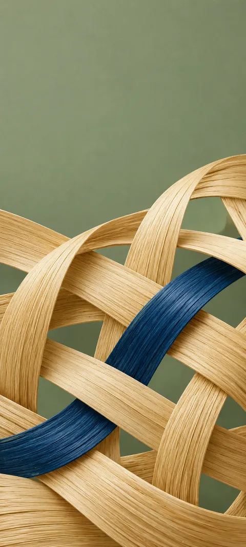 Golden straw strips loosely woven around a deep blue strip on sage green.