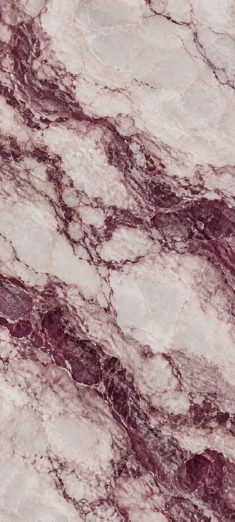 Plum marble veins sweep across pale stone.