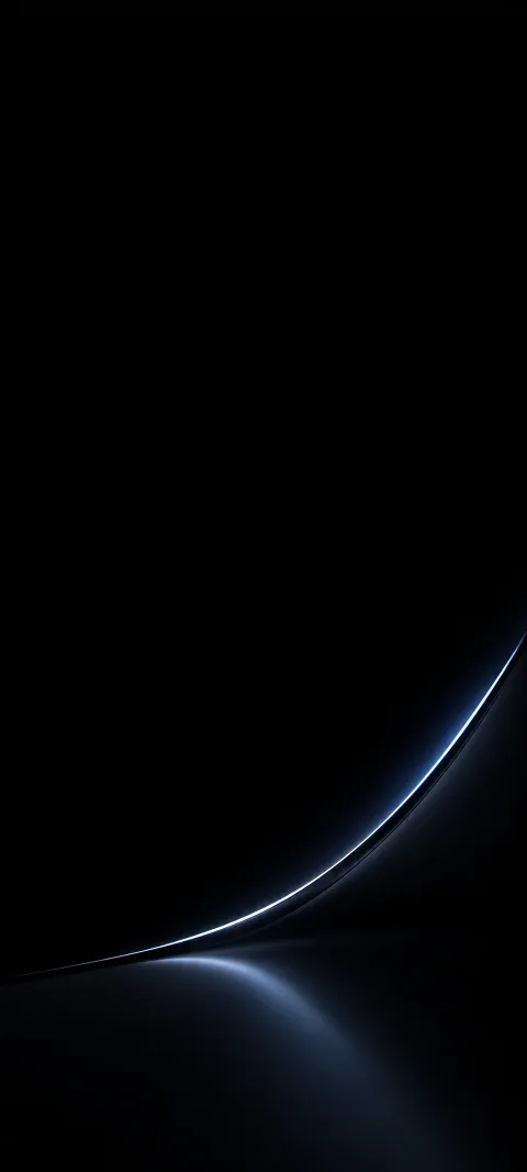 A cool highlight traces the edge of black glass.