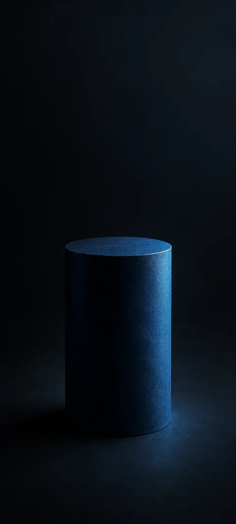 A dark blue cylinder stands in soft shadow.