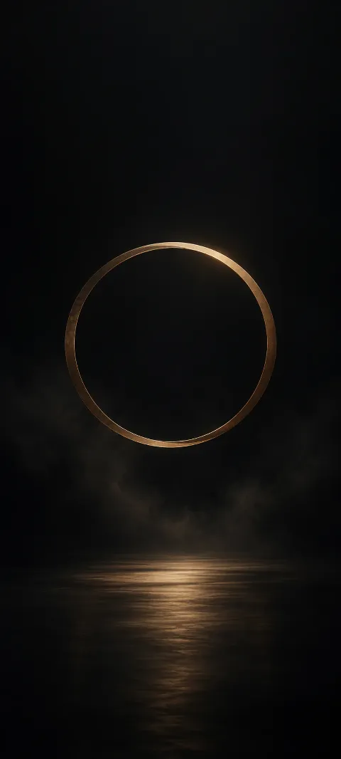 A muted bronze circle sits low in black.