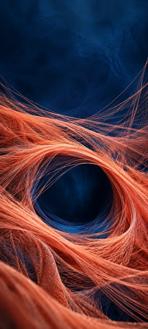 Fine coral silk threads curving around a dark indigo opening.