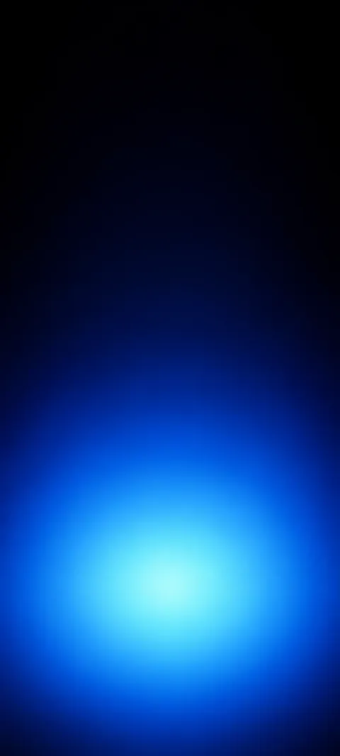 Low circular aqua glow fading outward into deep blue.