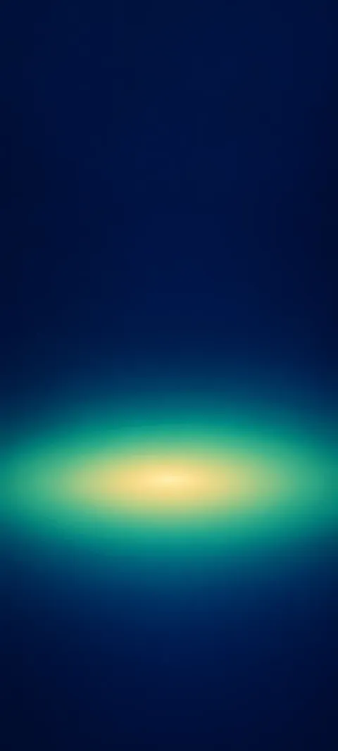 A low jade oval with a gold center against deep navy.