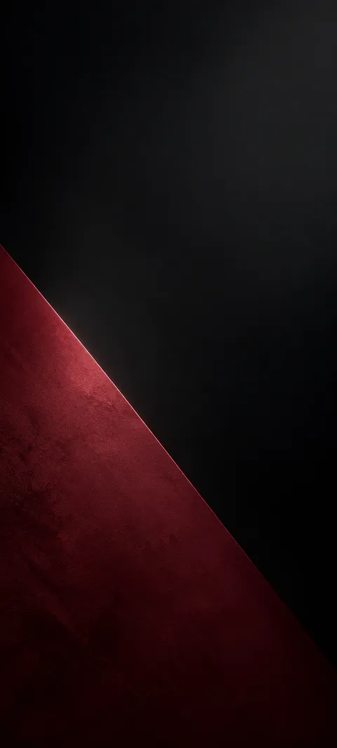 Wine-red triangular plane at the lower left of a near-black background.