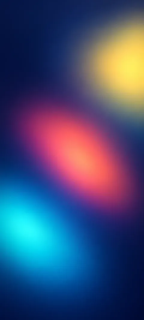 Cyan, coral and yellow glows arranged diagonally on dark blue.