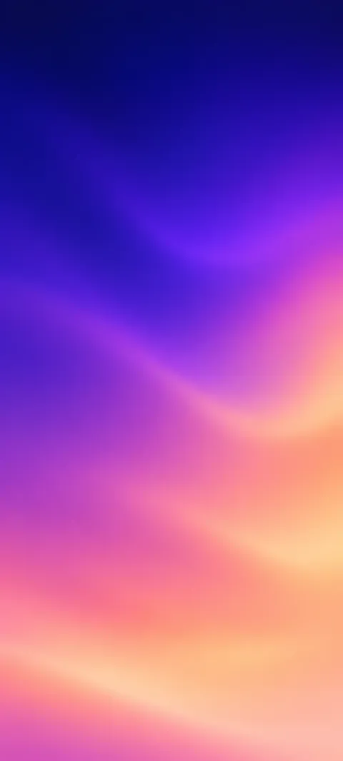 A smooth indigo-to-violet-to-peach color field.