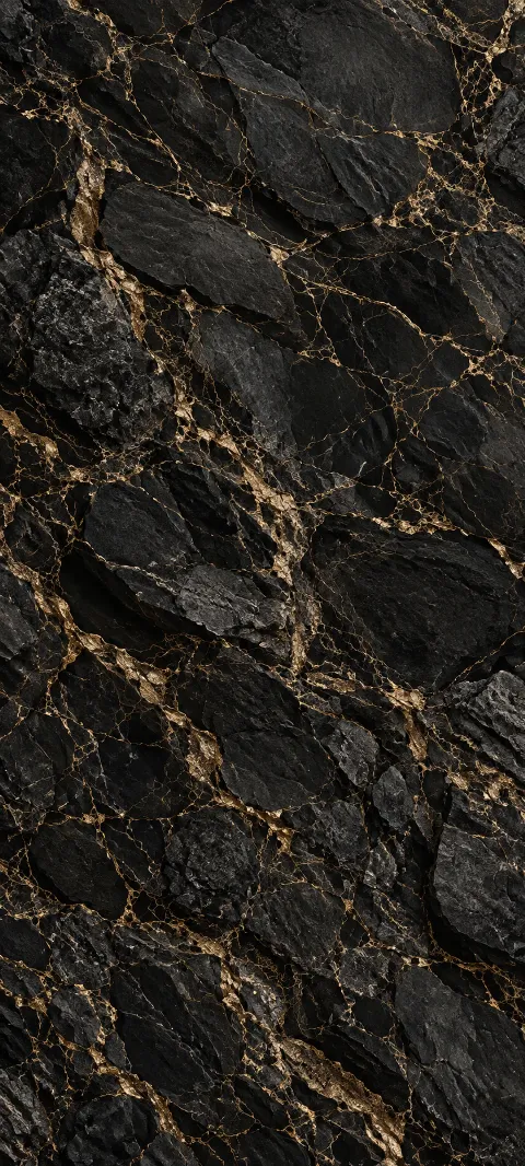 Black mineral grain carries narrow gold seams.