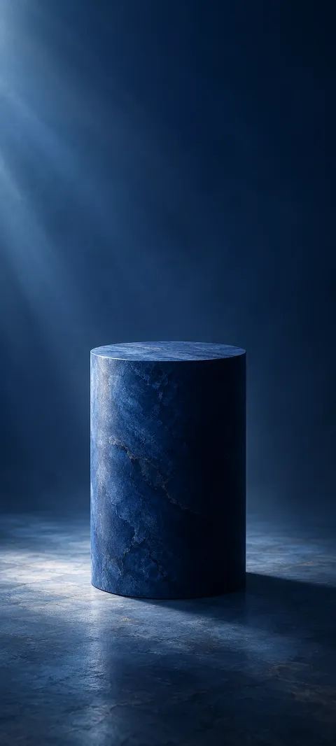 A dark blue cylinder stands in soft shadow.