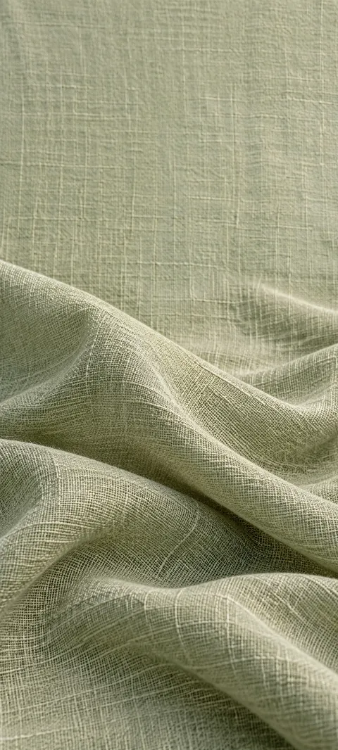 A sage linen weave fills the portrait with subtle fibers.