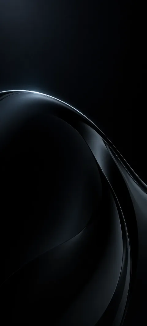 A cool highlight traces the edge of black glass.